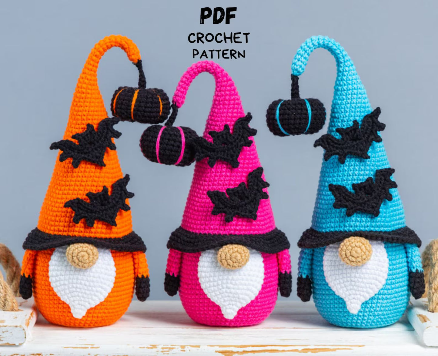 Three crocheted gnomes with Halloween-themed hats on a light gray background, featuring PDF crochet pattern text.